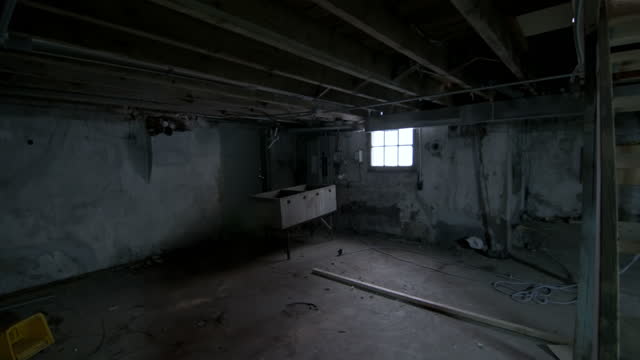 Old dark underground basement or closet in an old house.