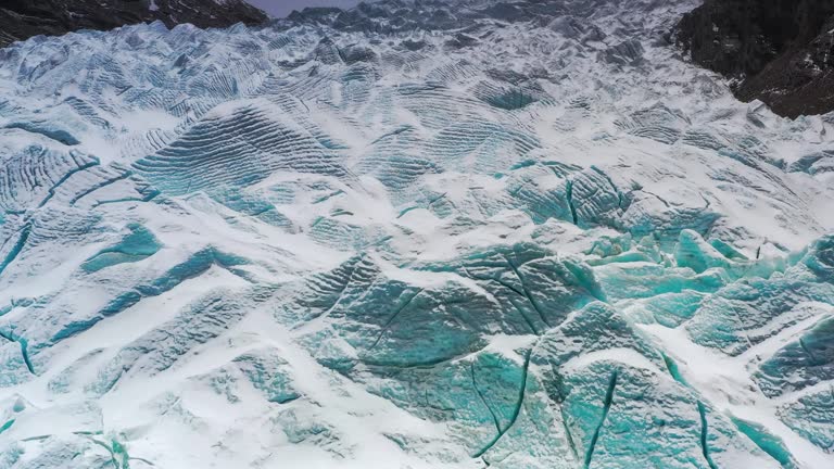 On the blue lake is a huge green glacier