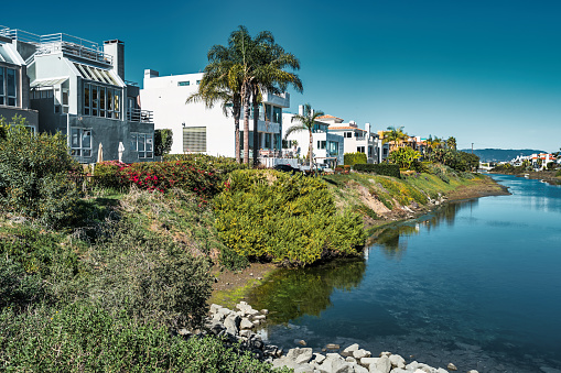 Waterfront houses and the Ballona Lagoon in Venice, Los Angeles, California, USA.