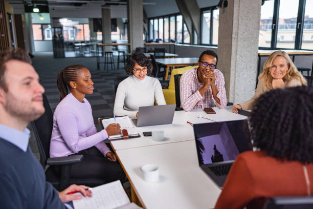 istock Business Meeting In A Big Open Office 1461440737