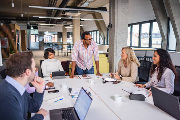 istock Diverse Business People At Board Meeting 1461440746