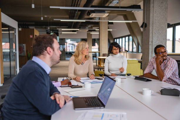 istock Business Meeting In A Big Open Office 1461440768