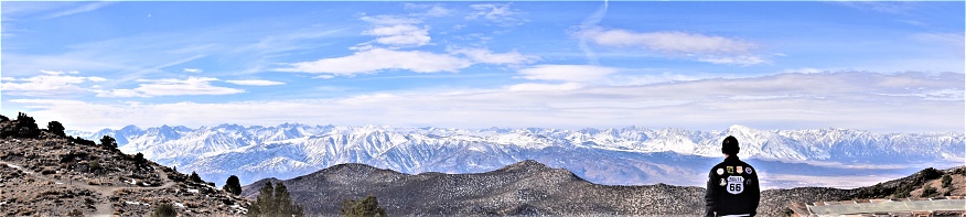 Staring out into the snowy mountains range near Inyo Mountains, Ca.