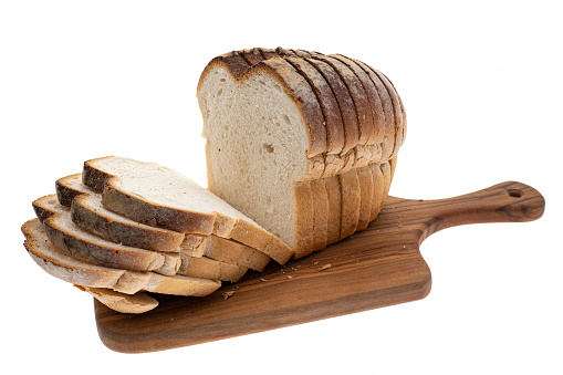 Loaf of white Farmhouse  bread - white background