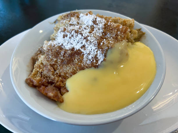 istock Rhubarb crumble with custard 1461443772
