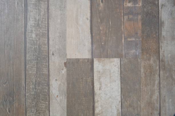 istock Wooden abstract background. Vertical gray old patched planks. 1461449511