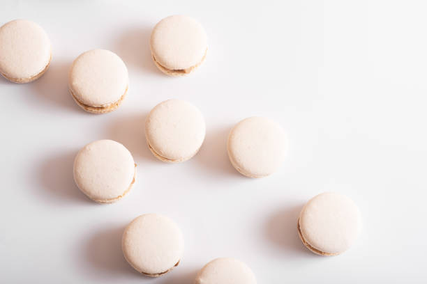 istock Tasty sweet macarons. Macaroons on white background. Top view. Copy space 1461450668