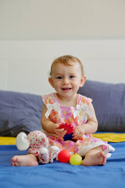 istock Girl Playing with Toys 1461452170
