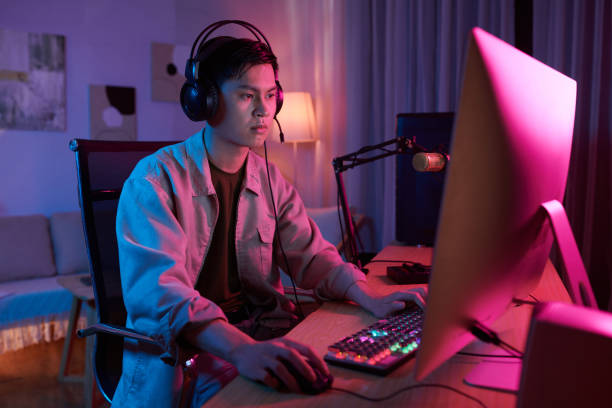 istock Boy Focusing on Playing Videogame 1461453075