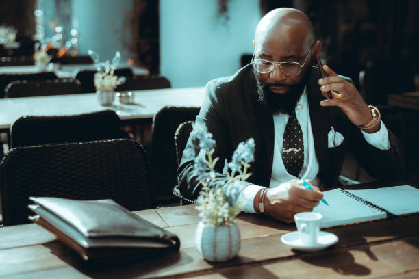 istock Black male working on a terrace bar 1461453081