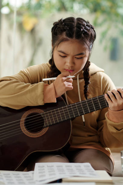 istock Girl Creating New Song 1461454424