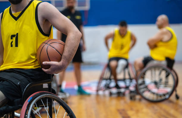 istock Basketball under a wheelchair user basketball player 1461457632