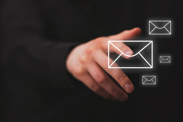 istock businessman logging in to his email, image with black background 1461462468