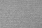 istock Beige velveteen upholstery fabric texture background. 1461467812