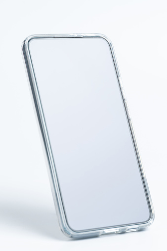 Smartphone in transparent cover in vertical view isolated