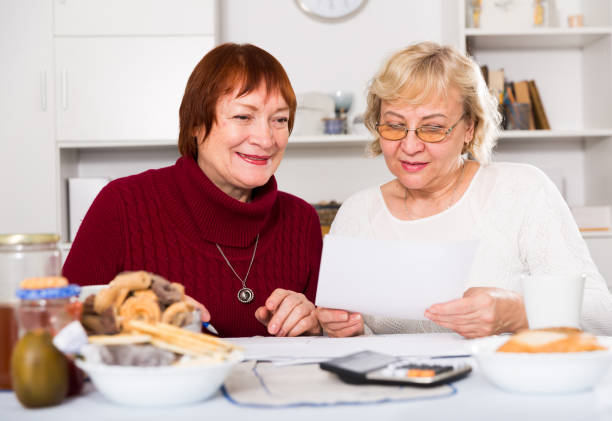 istock Positive old women with public utilities 1461473161