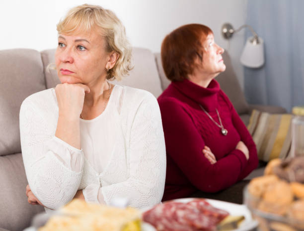 istock females quarreling in the room 1461473194