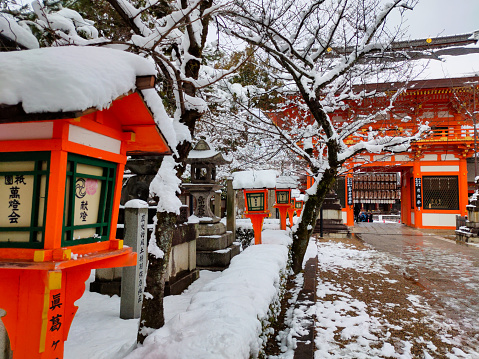 Kyoto, Japan - January 24 2023 : Yasaka Shrine with snow in winter. Gion Shrine.