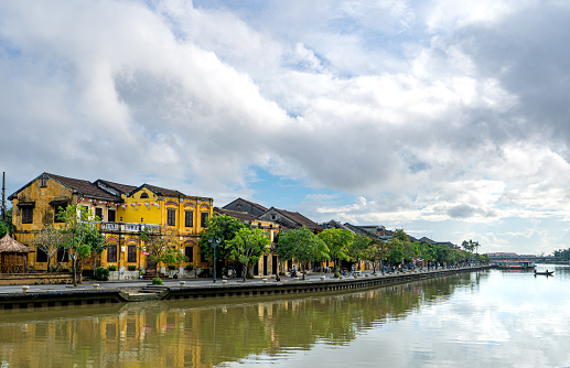 Hoi An, Vietnam - November 23, 2022: Sunrise over the Thu Bon River in the beautiful and historic Hoi An, a UNESCO World Heritage Site in Vietnam, Southeast Asia.
