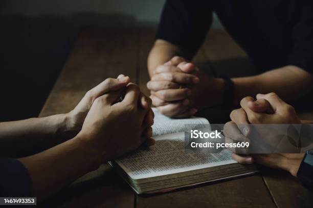 Christians And Bible Study Concept Christians Held Each Others Stock Photo - Download Image Now