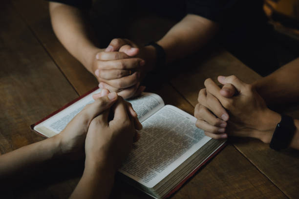 istock Christians and Bible study concept. Christians held each other's 1461493363