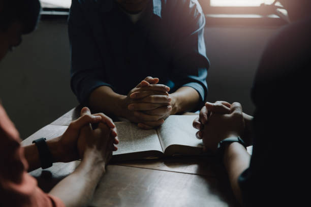 istock Christians and Bible study concept. Christians held each other's 1461493485