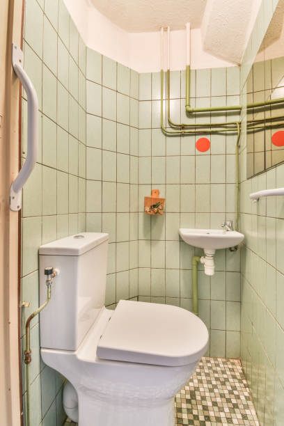 istock Lavatory with toilet and sink 1461499260