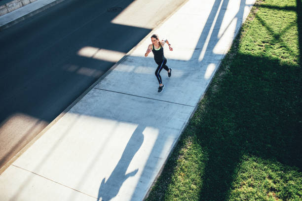istock Sportswoman running 1461504959