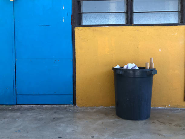 istock Garbage bin with trashes at the class corridor 1461511837