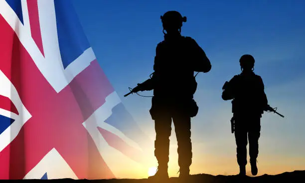 Vector illustration of Silhouettes of soldiers with United Kingdom flag