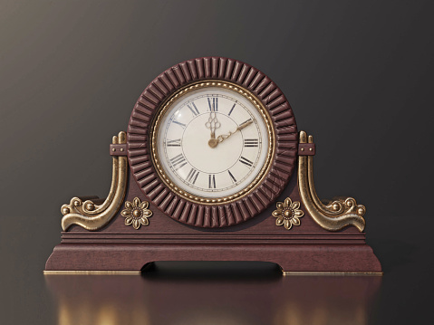 Antique, gold colored clock with original texture.