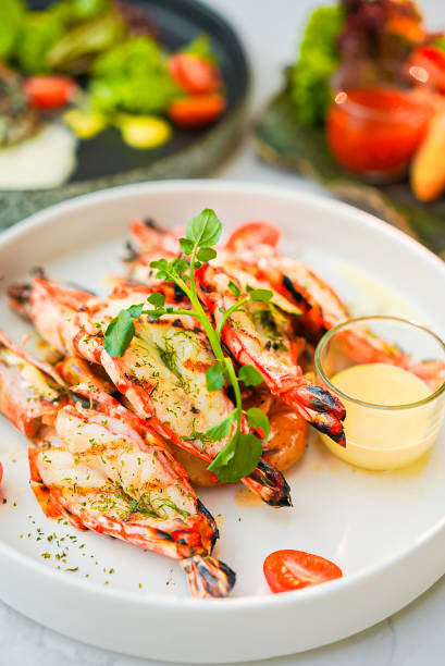 istock Grilled shrimp and sauce in a white plate 1461530088