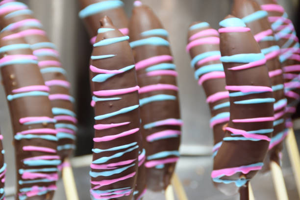 istock Chocolate banana coated with colorful chocolate. 1461533610