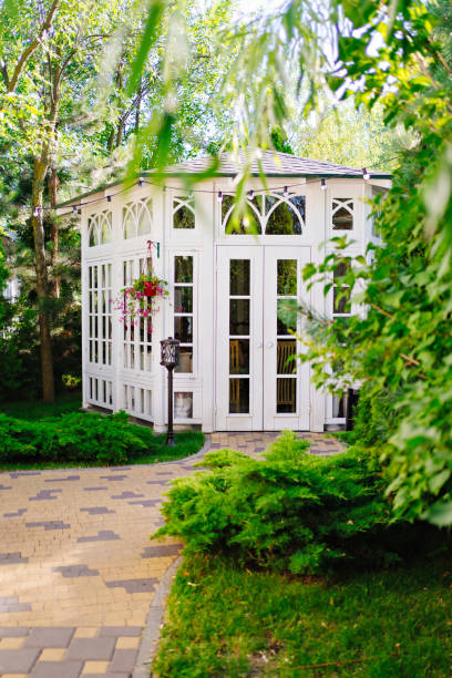 istock beautiful white glazed gazebo in the park. 1461536073
