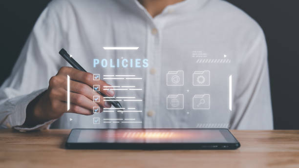 istock Businessman checking the steps through a virtual online document with a list of checkboxes Concepts of practices and policies, company articles of association Terms and Conditions,Privacy Policy 1461537713