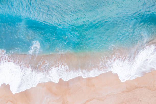 istock A sea waves and beach aerial view, natural background. 1461543359