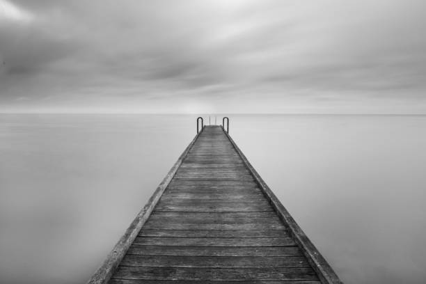 istock Scenic view of a jetty in calm waters 1461548497