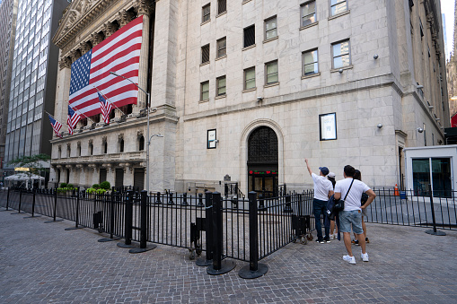 New York, NY, USA - July 4, 2022: The main facade of the New York Stock Exchange (NYSE) Building in the Financial District of Lower Manhattan, New York City.