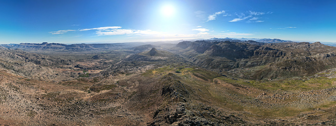 High Up drone point of view panorama wide angle morning image looking east over the Southern part of the Cederberg mountain range, Western Cape, South Africa.  One can see Sanddrif, Kromrivier, Tafelberg Cederberg, The Pup, Sugarloaf Peak , Winterbach Peak, Murray Peak, the Craigs.