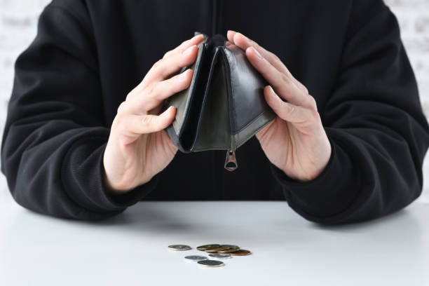 Man with trouble for lack of money images Man with trouble for lack of money images money shortage stock pictures, royalty-free photos & images