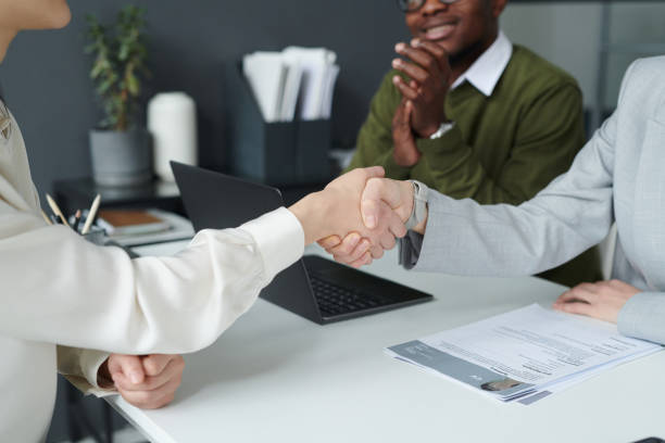 istock Business partners concluding a deal 1461554460