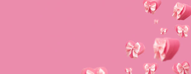 istock Heart shaped gift boxes isolated on pink background. Valentine's day banner background 1461557797