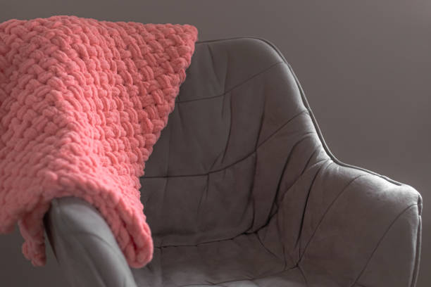 istock A plush blanket on a chair in a home interior 1461558764