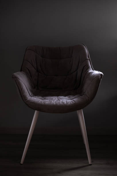 istock Upholstered furniture in subdued light 1461558773