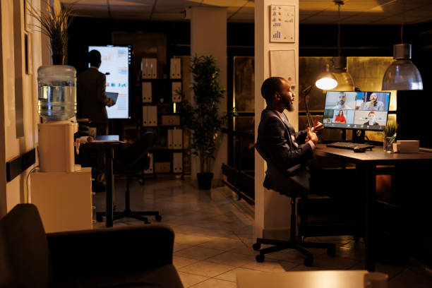istock Businessman having online discussion with remote team 1461560598