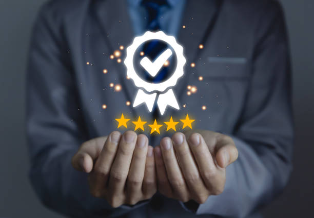 istock Two hands businessman showing best quality assurance service icon symbol 1461561014