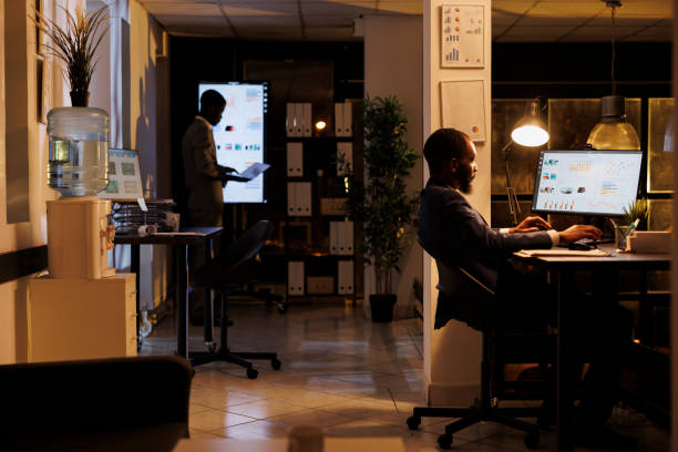 istock Corporate employee working overhours at marketing project 1461562821