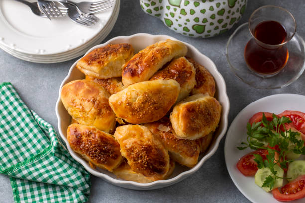 istock Turkish cuisine; Handmade Cheese Pastry (Turkish name; peynirli pogaca) 1461564598