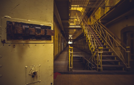 Walking down the hallways of a abandoned prison