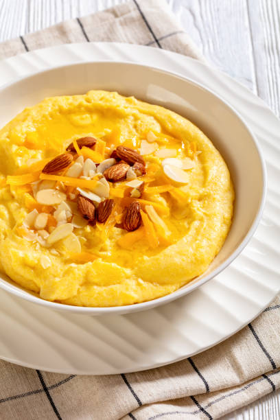 istock corn grits with butter, vegan cheese, and almonds 1461567636